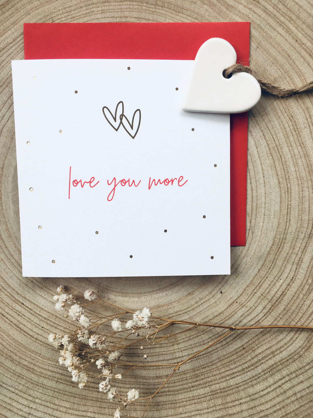 Love you more Greeting card